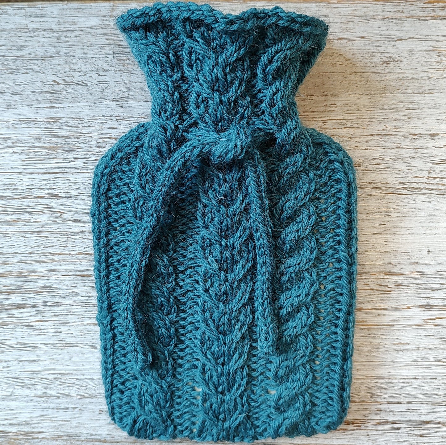 Confident Cables - knit a hot water bottle cover