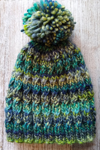 Knit a bobble hat in the round